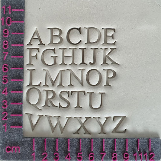 Ensemble de lettres de timbre d'argile - police de machine à écrire