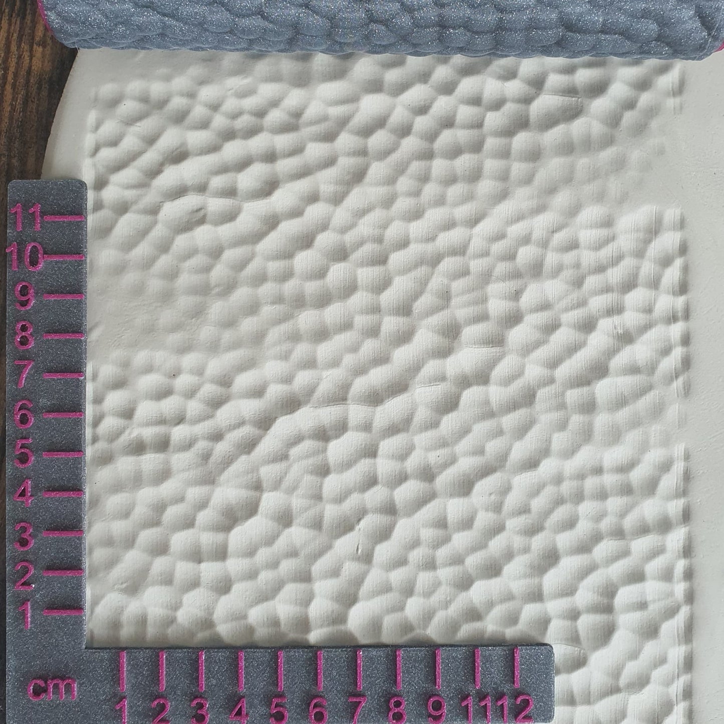 Coup de marteau à rouleau structurel