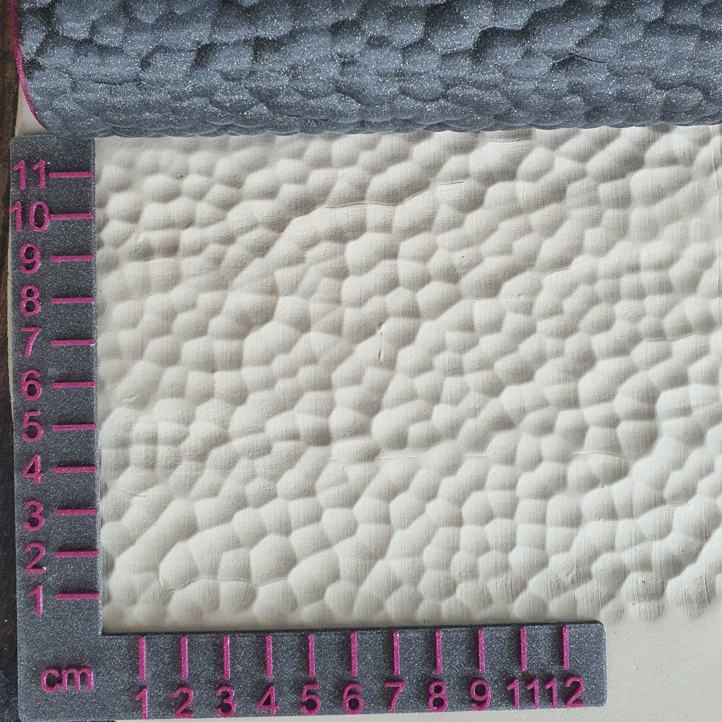 Coup de marteau à rouleau structurel