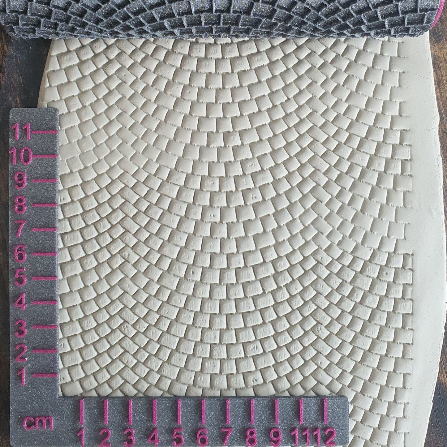 Rouleau structurel de pavés