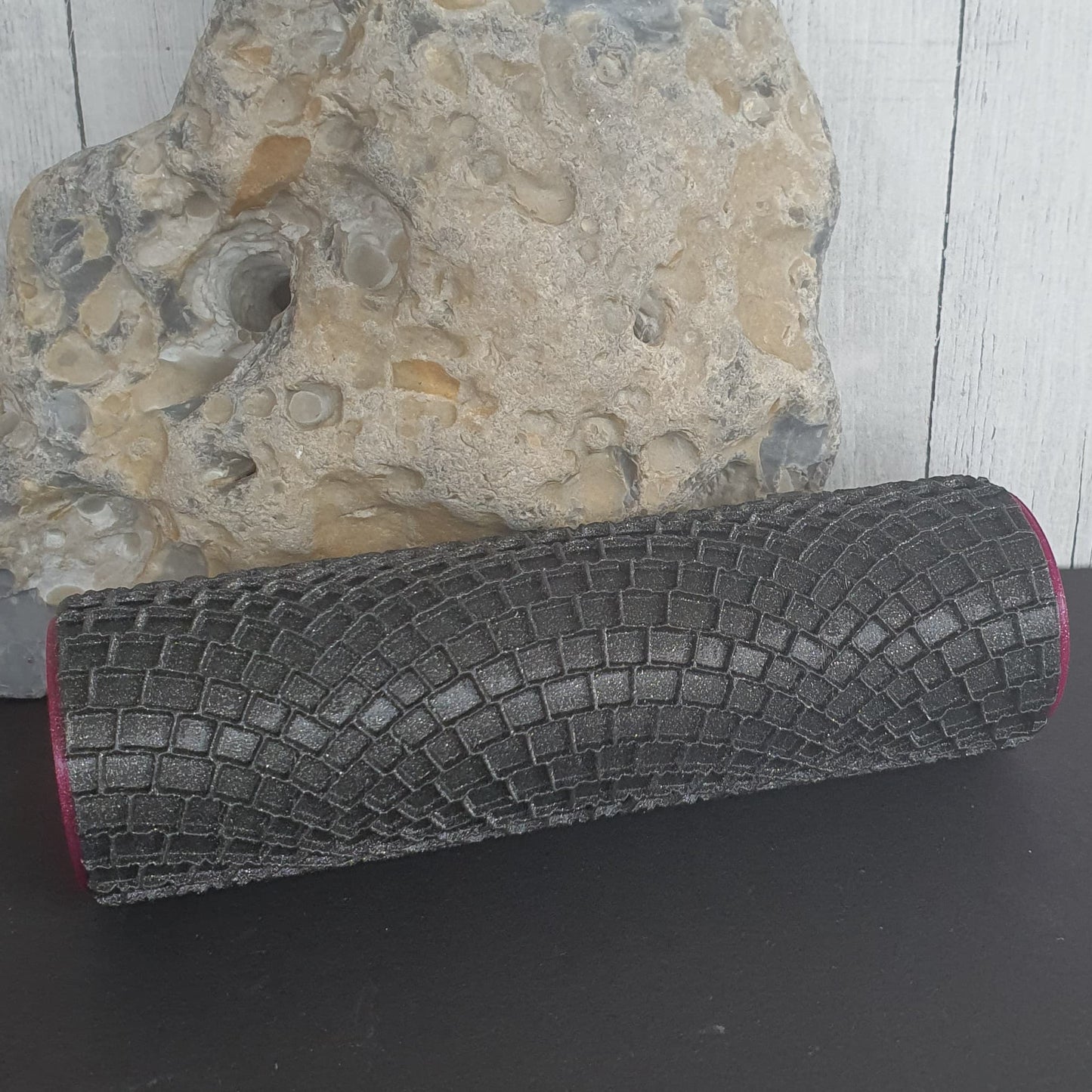 Rouleau structurel de pavés