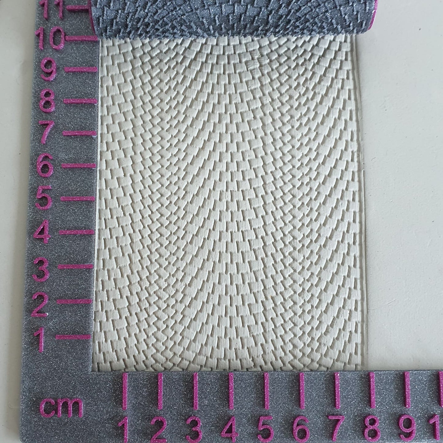 Rouleau structurel de pavés