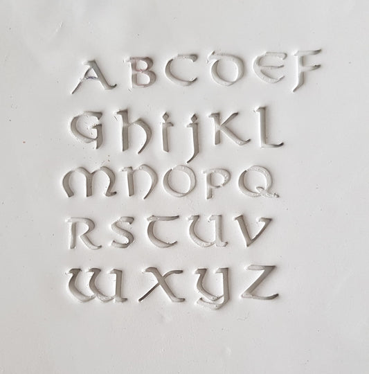 Timbres en terre cuite - Ensemble de lettres vikings