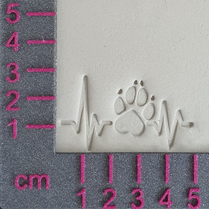 Stamp plate heartbeat dog