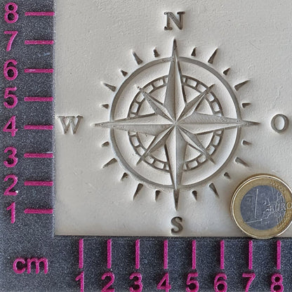 Stamp plate compass wind rose